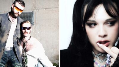 Someone lying down with grass and other foliage causing shadows on their face, wearing a white top