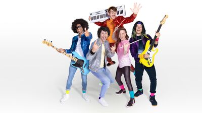 Five adults in colorful 80s-inspired outfits with musical instruments pose excitedly as a band. They include a bassist, guitarist, drummer, and keyboardist.