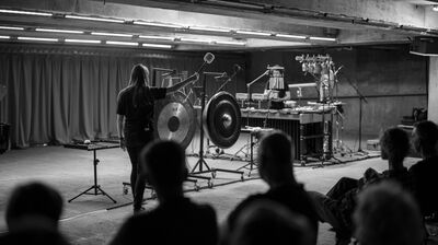 GBSR Duo in a car park with percussion in a concrete car park