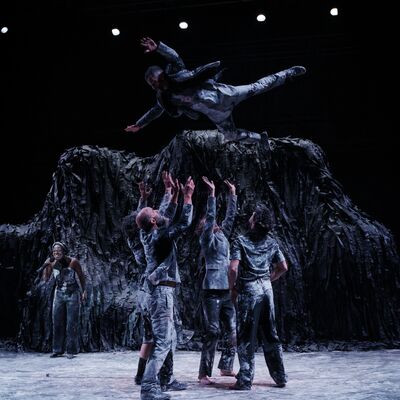 Dancers perform on a stage