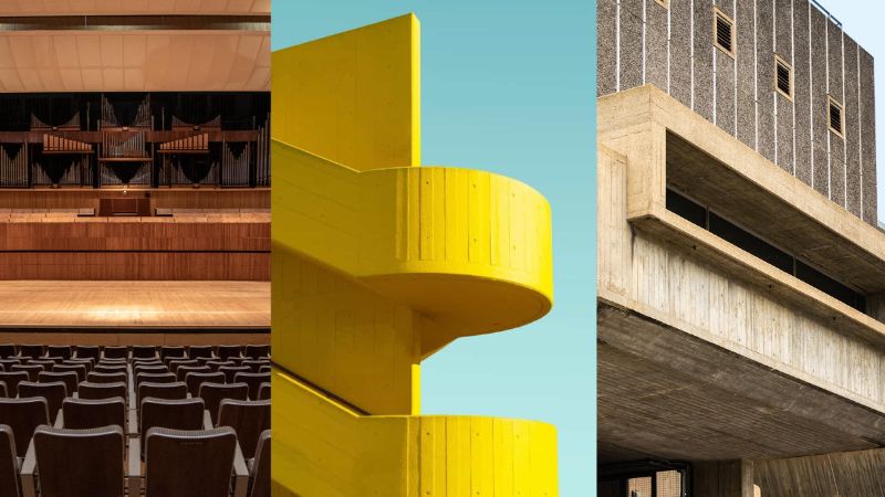 A young Black woman with curly hair sits smiling among the seats of the Royal Festival Hall