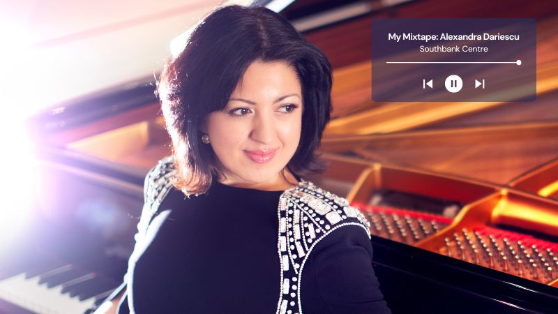 Alexandra Dariescu, a young woman with short dark hair, sits on a piano stool and leans back against the keys of the accompanying grand piano.