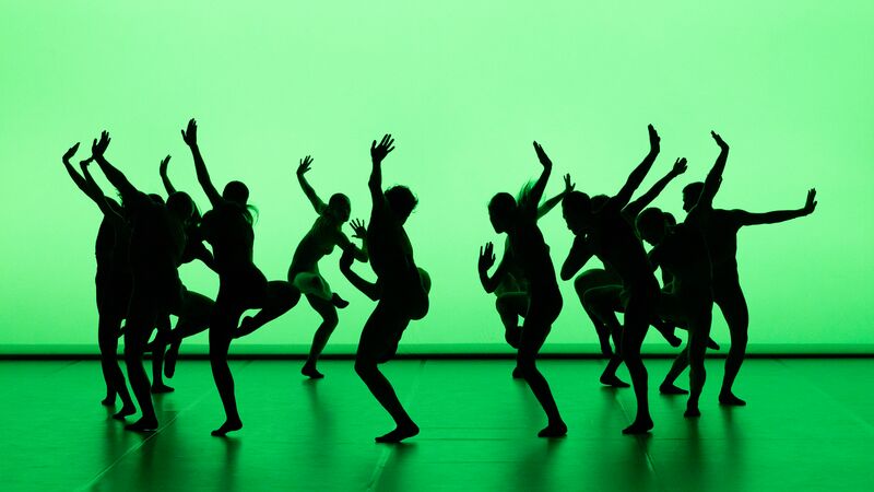 Dancers perform on a stage