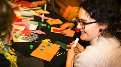 Participants taking part in a Creative Encounters collaging workshop.