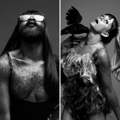 Two performers one on the left wearing large glasses and looking up, on the left has a crow on their shoulder