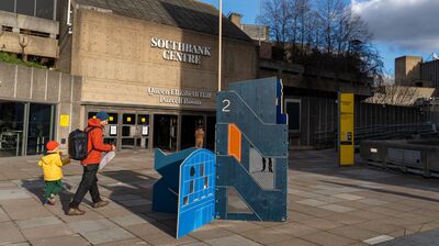 A blue temporary playstation sits outside the Southbank Centre