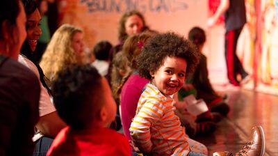 Young boy enjoying a performance during the Imagine Festival at the Southbank Centre