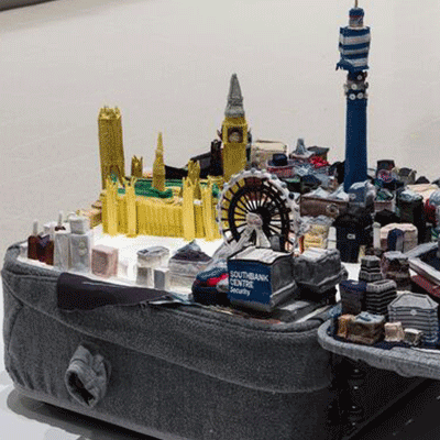 Gif of installation view of Chiharu Shiota's artwork and an upclose of Yin Xiuzhen's artwork