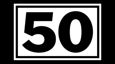 Green droplets of light hang in rows and rows from the ceiling, people stand beneath them