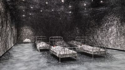 People asleep in white beds in a room full of black threads which intricately cocoon them