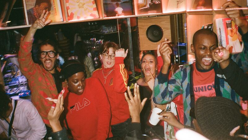 A group of diverse adults caught dancing