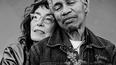 Beverly Glenn-Copeland and his wife/artistic partner, resting their heads on each other.
