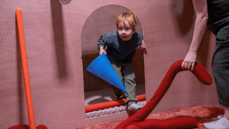 a gif of kids playing in a recyled playground