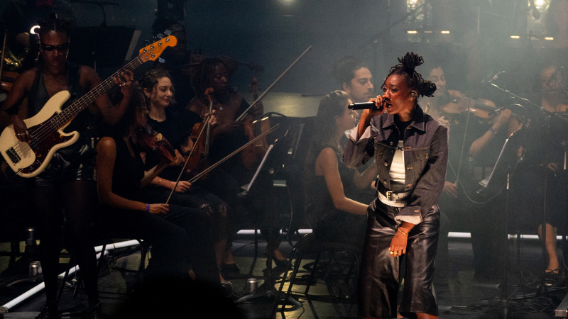 Little Simz on stage with the Chineke! Orchestra behind her