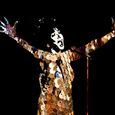 Silhouette of a singer with arms raised, composed of shimmering gold sequins against a solid black background.