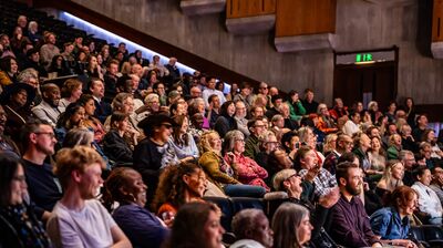 Audience members in the Southbank Centre's Queen Elizabeth Hall