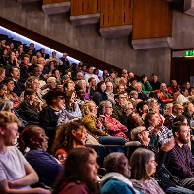 Audience members in the Southbank Centre's Queen Elizabeth Hall