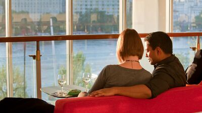 Couple having a drink in the member's area of the Southbank Centre