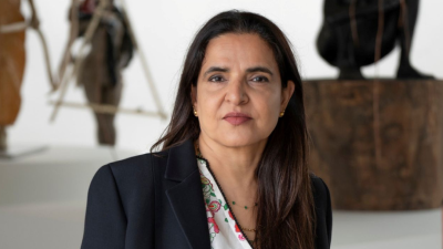 Woodland area with banana trees and flowers.