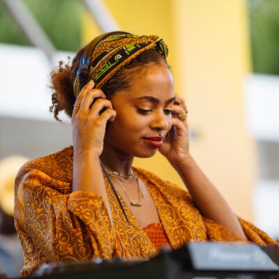 Counterpoint Arts, Female DJ on the Riverside Terrace