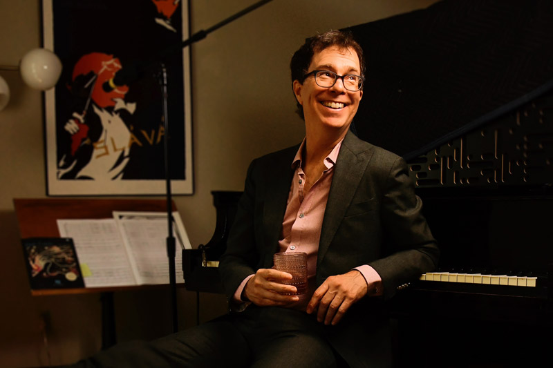 Ben Folds sitting at the piano.