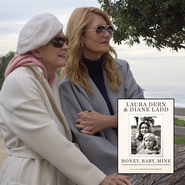 Laura Dern and Diane Ladd holding hands in front of the ocean.