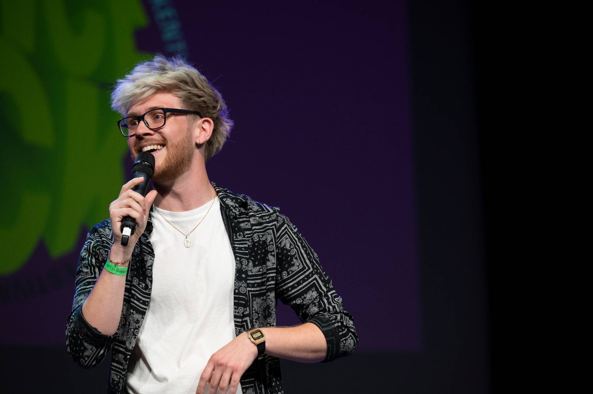 A comedian performing stand up.