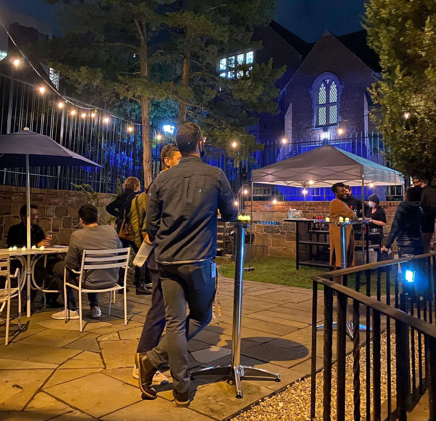 A photo of audience members enjoying the Garden Bar at the Yale Cabaret